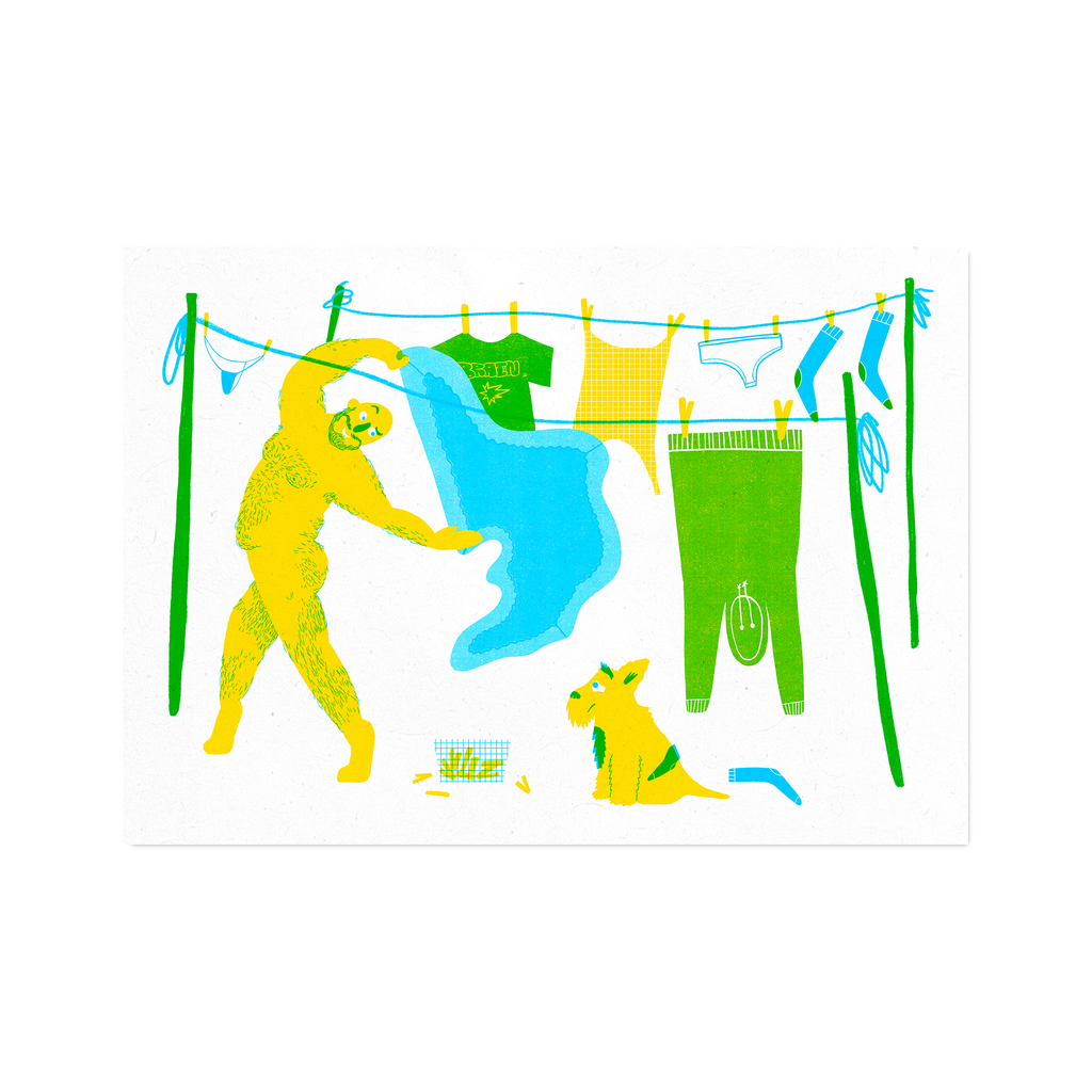 Framed mock up of risograph printed artwork of naked hairy man hanging up washing on line, with a dog unpleasantly looking up at him waving a bed sheet around.
