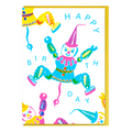 Colorful birthday card with a vintage toy clown puppet on string illustration and 'Happy Birthday' text, with canary yellow envelope.